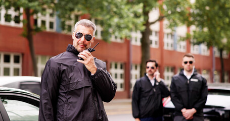 Professional VIP security guard safeguarding business executives