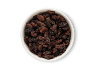Ceramic bowl with sweet dark raisins made from red grapes isolated on white background.Top view.