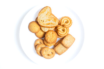 Danish butter cookies, butter cookies on a white plate isolated white background