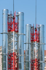 large industrial shiny metal pipes