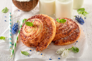 Closeup of coconut rolls made of butter. Scandinavian dessert.