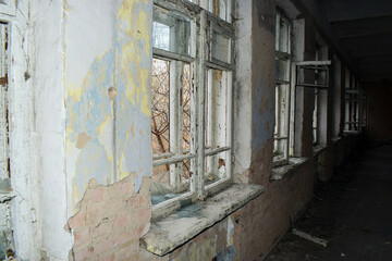 old abandoned premises, ruin. empty territories, abandoned houses. concept of war, Chernobyl disaster, apocalypse. brick buildings. sad view, heavy atmosphere. desolation and destruction of the abode