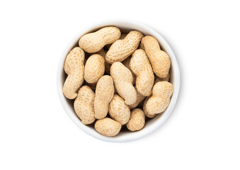 Bowl with healthy peanuts nuts with white shell isolated on white background.Top view.