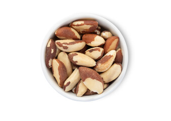 Bowl with exotic brazil nuts isolated on white background.Top view.