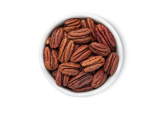 Bowl with healthy exotic brown pecan nuts isolated on white background.Top view.