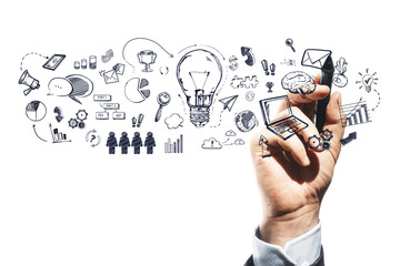 A hand drawing various business and communication symbols in doodle style on a white background, representing brainstorming and planning concepts