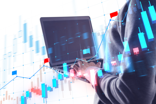 A person using a laptop with superimposed financial graphs, on a white background, illustrating data analysis