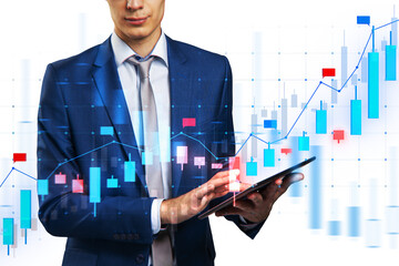 A businessman analyzing financial graphs on a tablet, superimposed on a dynamic stock market chart, with a white background