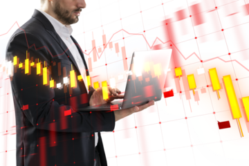 A businessman analyzing financial charts on a laptop, depicted in a double exposure style on a white background, conveying a concept of market analysis