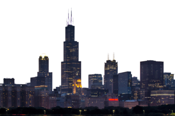The Chicago skyline at dusk with illuminated buildings against a darkening sky, concept of city life