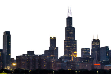 Chicago city skyline at dusk, featuring illuminated skyscrapers against a dark sky, conveys an...