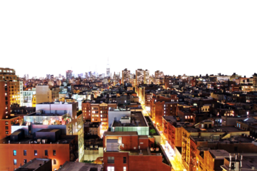 A panoramic view of New York City's skyline with illuminated buildings against a night sky, showcasing the cityscape of Manhattan