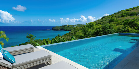 Fototapeta premium Looking out to the Caribbean from a beautiful pool side villa