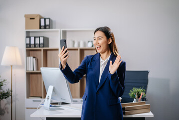 Confident business expert attractive smiling young woman holding digital tablet  on desk