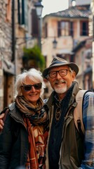 Fototapeta premium Caucasian retired couple traveling in a historic city at sunset