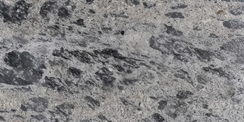Fototapeta premium Abstract black and white marble texture with gray and white spots and veins