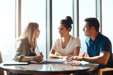 Couple, document and discussion with investment advisor for financial planning, compliance and agreement. Office, married people and consultant with paperwork for budgeting, saving and future goals