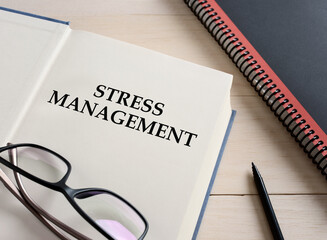 Stress management titled book on the office desk.