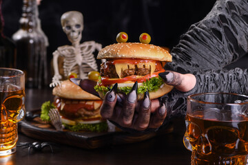  Hot dog Bloody fingers in the hands of a witch. Halloween appetizer