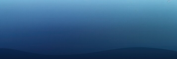 Obraz premium Simple blue gradient background with a subtle curve at the bottom