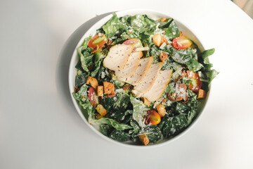 A colorful plate of fluffy white rice with seasoned vegetables and savory grilled chicken makes a delicious and healthy meal