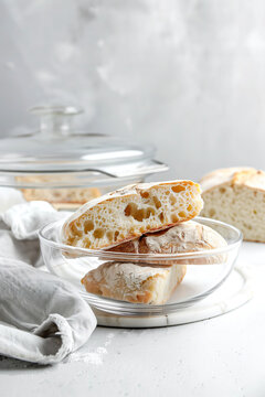 Fresh ciabatta bread displayed in elegant kitchen setting. Generative AI image