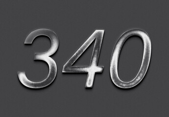 Chrome metal 3D number design of 340 on grey background.
