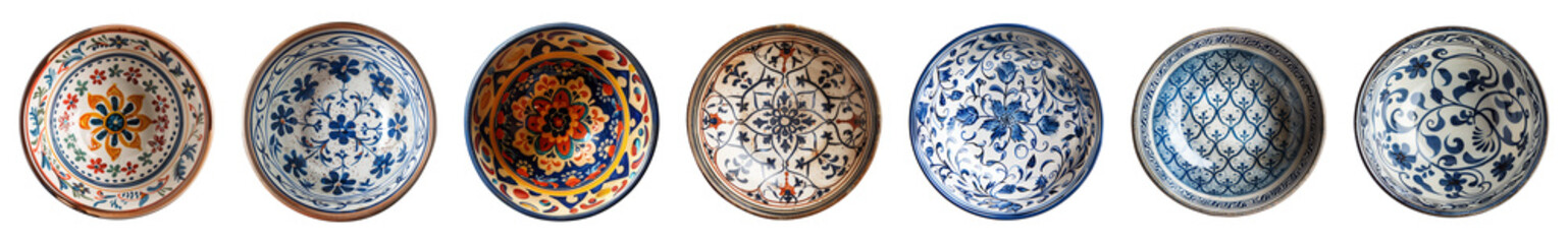 Naklejka premium Collection of empty ceramic bowls or plates with a pattern or painted ornament isolated on a transparent background, view from above, cut out, PNG