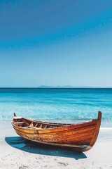 Fototapeta premium Wooden colorful boat on the beach with blue water and sky in the background. Beautiful summer poster. 