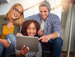 Students, university and tablet in art school for fashion design in campus or college with positive mood. Gen z, group of people and tech for class project in team, partnership and collaboration