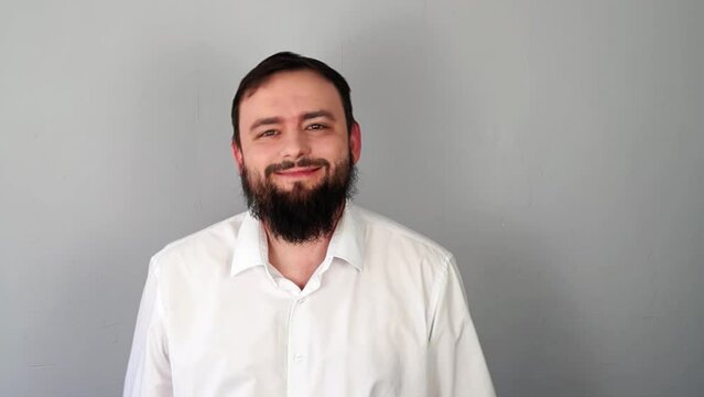 Man man gives up waving his hand at something