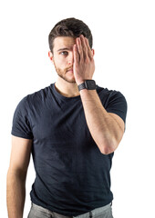 A man is seen with his face and one eye covered by his hand in a gesture of distress or sadness. His fingers appear tense, conveying a deep emotion through body language.