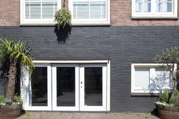 fachada de casa ladrillo y planta &Aacute;msterdam