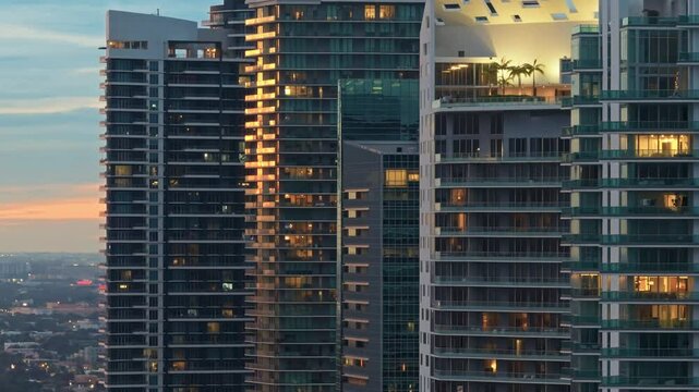 Establishing aerial panoramic shot of Miami Skyline Brickell downtown in 4K. Beautiful aerial shot of Miami modern skyscraper illuminated. Best Miami aerial shot