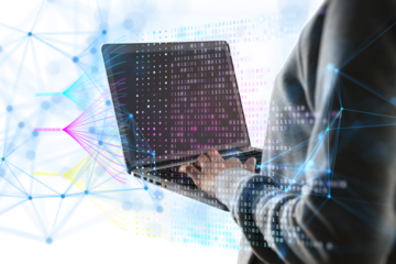 A person in a hood typing on a laptop, with a digital overlay of binary code and network connections on a white and blue background, concept of cybersecurity