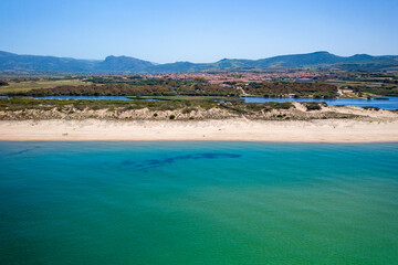 Drone aerial view of San Pietro a Mare wild beach coast in Sardinia, Italy