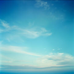 Obraz premium light blue sky with gradient and soft clouds