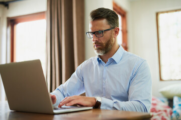 Fototapeta premium Laptop, confused and businessman in house reading online for stock market crash with investment loss. Stress, computer and financial trader with decline of foreign exchange price on internet in home.