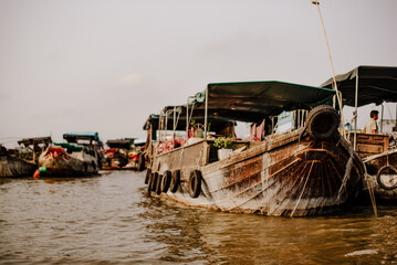 A merchant boat on the Cai Rang floating market in Can Tho, Vietnam