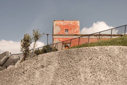 On the Belvedere of Monte Echia in Naples then admire ancient buildings