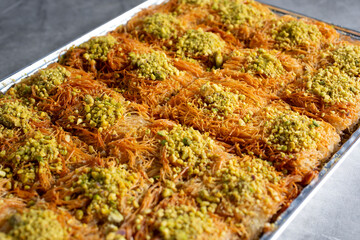 A closeup view of a tray kunafa.