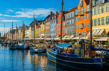 Boats in Nyhavn harbor in Copenhagen center. Denmark.