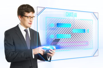 A businessman interacting with a futuristic holographic chat AI interface on a white background, depicting modern communication technology