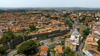 Obraz premium Aerial view of the historic center of Viterbo and its walls that separate it from the modern city. It is one of the capitals of Lazio and is located in central Italy.