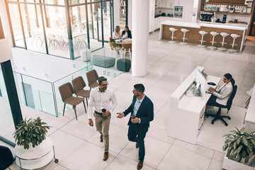 Top view, business people or walking to meeting for teamwork, ideas or collaboration together....