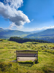 A bench overlooking a beautiful mountain landscape of the Mawddach river valley and estuary. View from the scenic Precipice Walk hike. Dolgellau, Barmouth, Gwynedd, Snowdonia National Park, Wales © Pawel