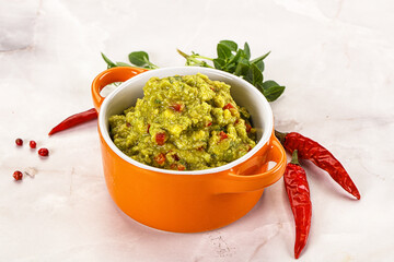 Guacamole with avocado, tomato and chili