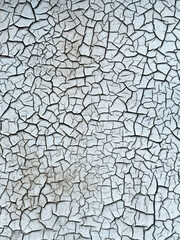 Old cracked paint forming abstract pattern backgrond or textured surface