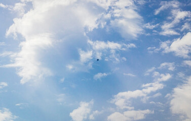 Silhouette of the MIG fighter jet in the cloudy sky. Military