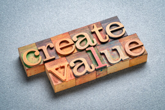 create value typography - words in vintage letterpress wood type blocks, inspiration, creativity and business  concept